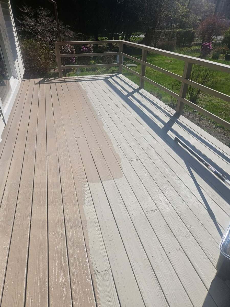 Deck Coat in Progress, fresh stain meeting old boards