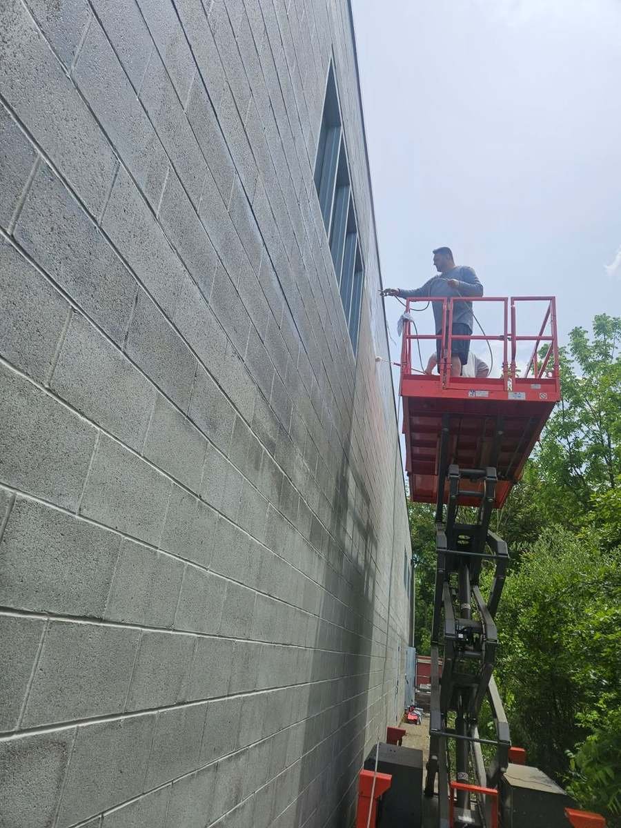 Scissor Lift Exterior, commercial wall from a lift